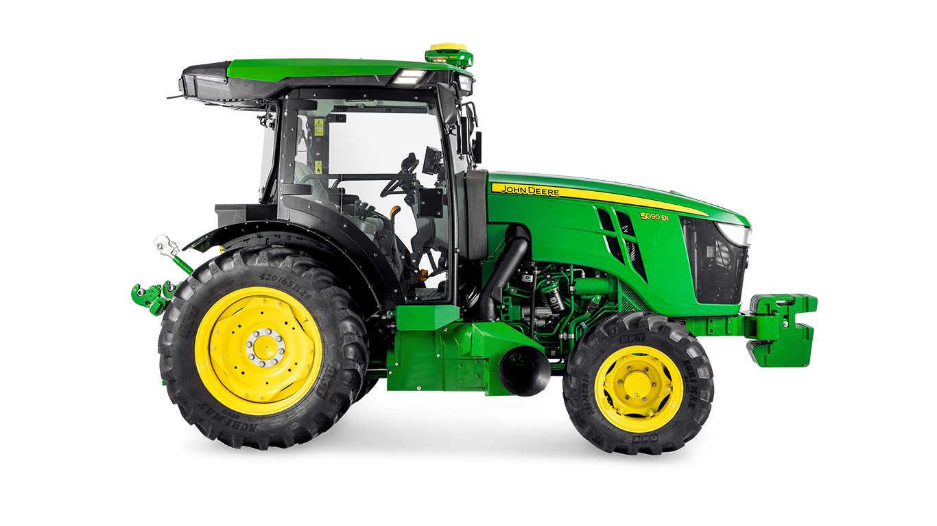„John Deere“ traktoriaus 5090EN šoninis profilis, išryškinantis kabinos konstrukciją ir dideles galines padangas.